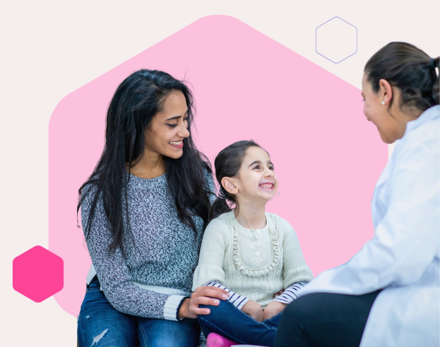 Image of a mother and daughter in front of a pale pink hexagon